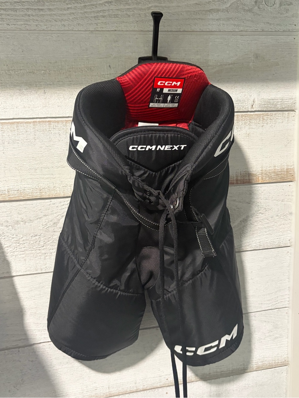CCM Next Youth Medium Hockey Pants Black Red